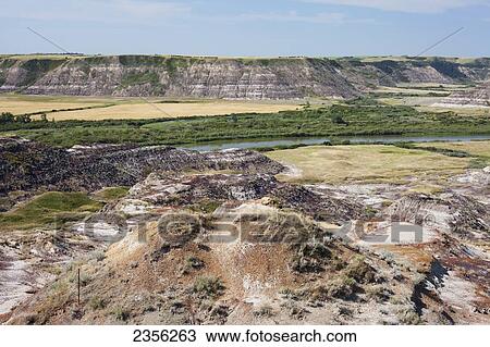 Landscape Of The Badlands; Drumheller, Alberta, Canada View Large Photo Image Stock Image - Landscape Of The Badlands; Drumheller, Alberta, Canada. Fotosearch