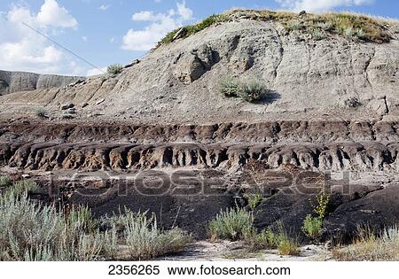 Landscape Of The Badlands; Drumheller, Alberta, Canada View Large Photo Image Stock Photography - Landscape Of The Badlands; Drumheller, Alberta, Canada. Fotosearch