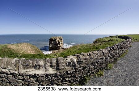 Marsden Rock In Marsden Bay; South Shields, Tyne And Wear, England View Large Photo Image Stock Photo - Marsden Rock In Marsden Bay; South Shields, Tyne And Wear, England. Fotosearch