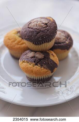 Stock Photography - Muffins On A Plate; Tarifa, Cadiz, Andalusia, Spain. Fotosearch