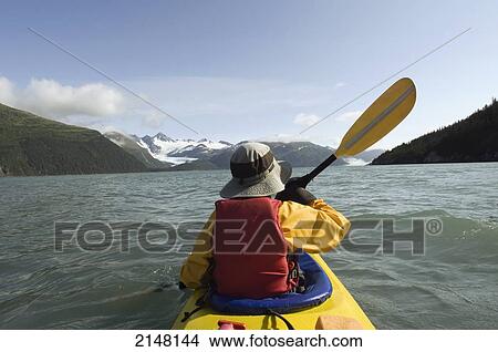 Person Sea Kayaking In Prince William Sound, Near Whittier, Southcentral, Alaska View Large Photo Image Picture - Person Sea Kayaking In Prince William Sound, Near Whittier, Southcentral, Alaska. Fotosearch