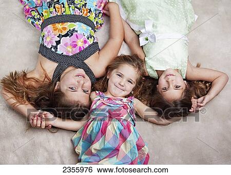 Portrait Of Three Sisters; Palmer, Alaska, United States Of America View Large Photo Image Stock Photograph - Portrait Of Three Sisters; Palmer, Alaska, United States Of America. Fotosearch
