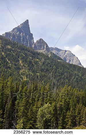 Rugged Peaks Of The Rocky Mountains In Waterton Lakes National Park; Alberta, Canada View Large Photo Image Stock Photography - Rugged Peaks Of The Rocky Mountains In Waterton Lakes National Park; Alberta, Canada. Fotosearch