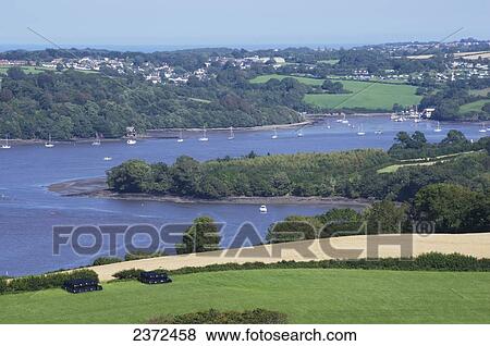 Stock Photo - Sailboats In The Harbour; Devon, England. Fotosearch