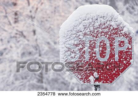 Stock Photo - Stop Sign Covered With Snow In Winter; Limehouse, Ontario, Canada. Fotosearch