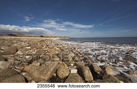 Stock Photo - Water Washing Up On The Rocks Along The Coast; Whitburn, Tyne And Wear, England. Fotosearch