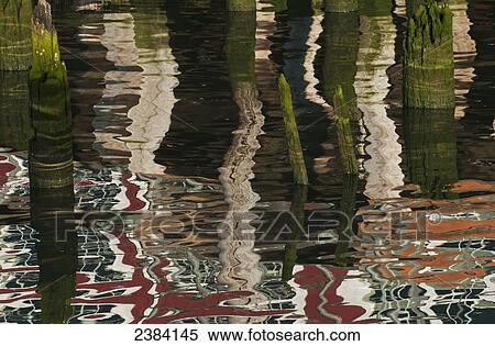 A building reflected on the Astoria waterfront; Astoria, Oregon, United States of America View Large Photo Image Stock Photography - A building reflected on the Astoria waterfront; Astoria, Oregon, United States of America. Fotosearch