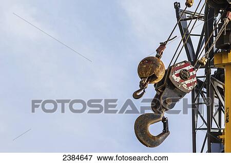 Stock Photo - A crane hook; Fort McMurray, Alberta, Canada. Fotosearch