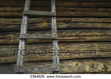 A cross-section of an old log home with a matching ladder; Eagle, Wisconsin, United States of America View Large Photo Image Stock Photograph - A cross-section of an old log home with a matching ladder; Eagle, Wisconsin, United States of America. Fotosearch