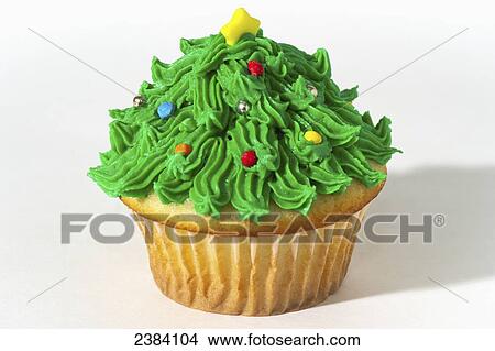 Picture - A cupcake decorated like a christmas tree; Alberta, Canada. Fotosearch