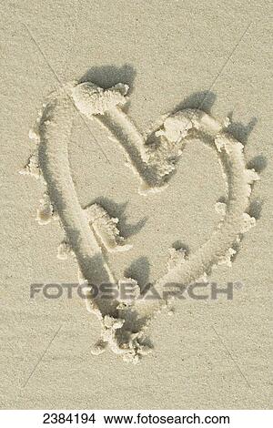Picture - A heart drawn in the sand; Koh Samet Island, Thailand. Fotosearch