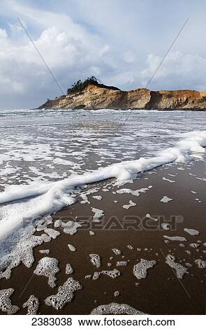 A popular beach is found at Cape Kiwanda; Pacific City, Oregon, United States of America View Large Photo Image Stock Photo - A popular beach is found at Cape Kiwanda; Pacific City, Oregon, United States of America. Fotosearch