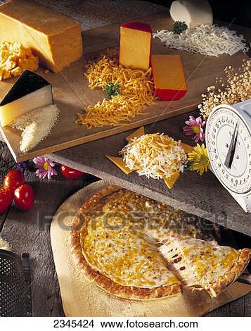 Agriculture - Dairy Products still-life with cheese pizza, blocks and grated cheese / studio. View Large Photo Image Picture - Agriculture - Dairy Products still-life with cheese pizza, blocks and grated cheese / studio.. Fotosearch
