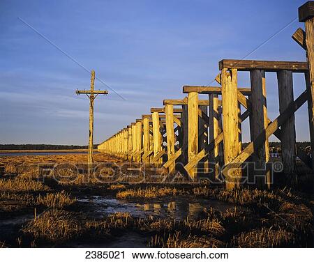 An old trestle stands at Trestle Bay; Hammond, Oregon, United States of America View Large Photo Image Stock Image - An old trestle stands at Trestle Bay; Hammond, Oregon, United States of America. Fotosearch