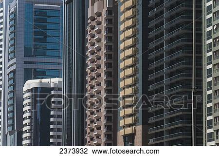 Apartment and office buildings lining Sheikh Zayed Road; Dubai, United Arab Emirates View Large Photo Image Stock Image - Apartment and office buildings lining Sheikh Zayed Road; Dubai, United Arab Emirates. Fotosearch