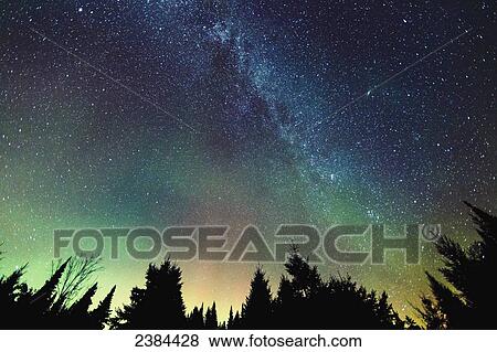 Aurora Borealis and milky way visible in the sky, Mont-Tremblant National Park; Lanaudiere region, Quebec, Canada View Large Photo Image Stock Photo - Aurora Borealis and milky way visible in the sky, Mont-Tremblant National Park; Lanaudiere region, Quebec, Canada. Fotosearch