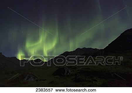 Stock Photo - Aurora Borealis (Northern Lights) dancing in the Talkeetna Mountains in Archangel Valley, Hatcher Pass, South central Alaska; Alaska, United States of America. Fotosearch