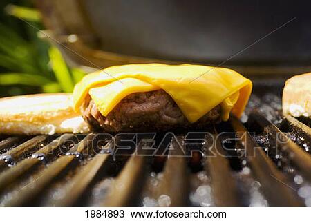 Barbecue Scene, Cheeseburger On The Grill. View Large Photo Image Stock Image - Barbecue Scene, Cheeseburger On The Grill.. Fotosearch