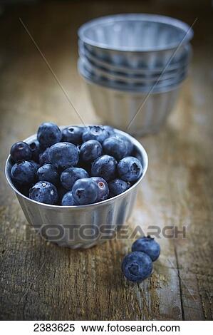 Blueberries in a cup View Large Photo Image Stock Photography - Blueberries in a cup. Fotosearch