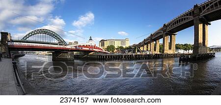 Stock Photo - Bridges crossing River Tyne; Newcastle, Tyne and Wear, England. Fotosearch