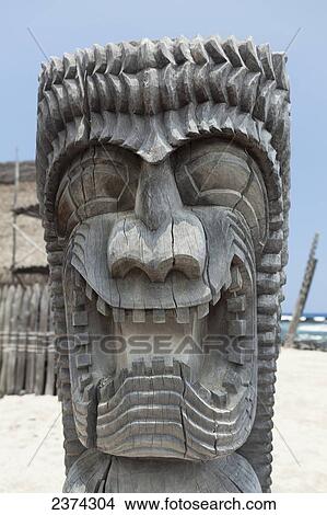 Picture - Carving of a face in City of Refuge National Historical Park; Big Island, Hawaii, United States of America. Fotosearch