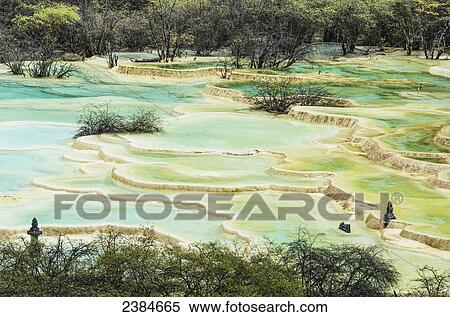 Colourful pools formed by calcite deposits; Huanglong, Sichuan province, China View Large Photo Image Stock Photography - Colourful pools formed by calcite deposits; Huanglong, Sichuan province, China. Fotosearch