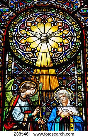Stock Image - Colourful stained glass windows in the Benedictine Abbey; Montserrat, Catalonia, Spain. Fotosearch