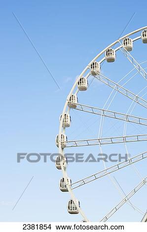 Detail of ferris wheel in Divo Ostrov amusement park; St. Petersburg, Russia View Large Photo Image Picture - Detail of ferris wheel in Divo Ostrov amusement park; St. Petersburg, Russia. Fotosearch