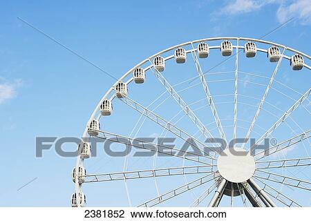 Stock Image - Detail of ferris wheel in Divo Ostrov amusement park; St. Petersburg, Russia. Fotosearch