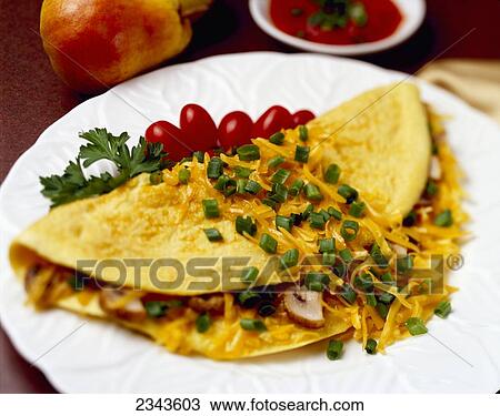 Food - Cheese and Mushroom Omelette garnished with chopped green onions (scallions) and pear tomatoes. View Large Photo Image Stock Image - Food - Cheese and Mushroom Omelette garnished with chopped green onions (scallions) and pear tomatoes.. Fotosearch