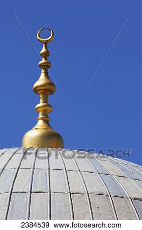 Islamic spire on top of the dome roof of a mosque; Istanbul, Turkey View Large Photo Image Stock Photo - Islamic spire on top of the dome roof of a mosque; Istanbul, Turkey. Fotosearch