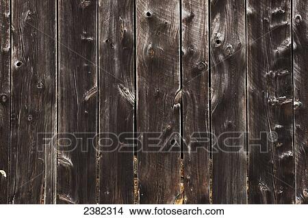 Picture - Knotted wood on a barn; Iron Hill, Quebec, Canada. Fotosearch