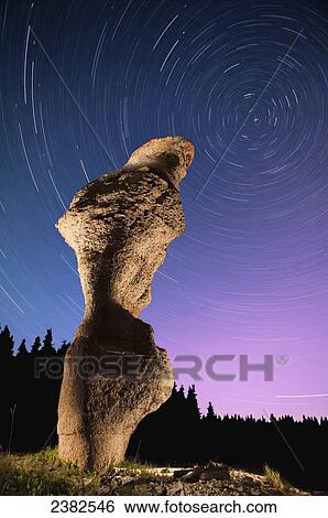 Light painting on monolith and star trails, Anse des Bonnes Femmes at Ile Niapiskau, Mingan Archipelago National Park Reserve of Canada, Cote-Nord, Duplessis region; Quebec, Canada View Large Photo Image Stock Photograph - Light painting on monolith and star trails, Anse des Bonnes Femmes at Ile Niapiskau, Mingan Archipelago National Park Reserve of Canada, Cote-Nord, Duplessis region; Quebec, Canada. Fotosearch