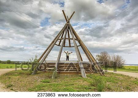 Man standing on the stage at the Papal Grounds; Fort Simpson, Northwest Territories, Canada View Large Photo Image Stock Image - Man standing on the stage at the Papal Grounds; Fort Simpson, Northwest Territories, Canada. Fotosearch