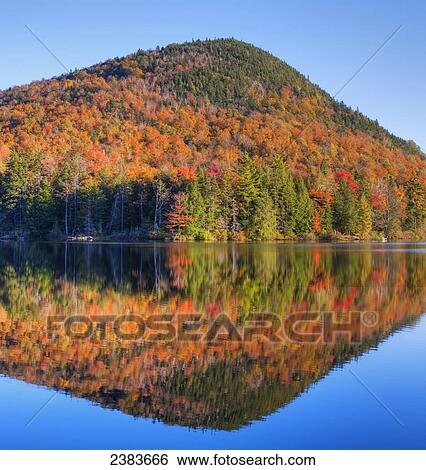 Mountain reflected in Sugarloaf pond in autumn; Quebec, Canada View Large Photo Image Stock Photograph - Mountain reflected in Sugarloaf pond in autumn; Quebec, Canada. Fotosearch