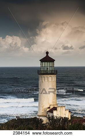 North Head Lighthouse complemented by clouds and surf; Ilwaco, Washington, United States of America View Large Photo Image Picture - North Head Lighthouse complemented by clouds and surf; Ilwaco, Washington, United States of America. Fotosearch