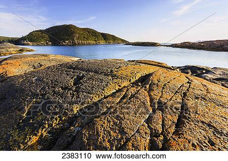 Stock Image - Pointe Sud at sunset, Grande Basque Island, Sept-Iles, Cote-Nord, Duplessis region; Quebec, Canada. Fotosearch