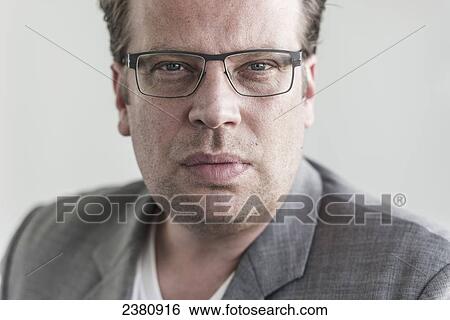 Portrait of a businessman; Locarno, Ticino, Switzerland View Large Photo Image Stock Photograph - Portrait of a businessman; Locarno, Ticino, Switzerland. Fotosearch