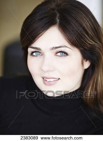 Portrait of a woman with brunette hair and blue eyes; Montreal, Quebec, Canada View Large Photo Image Stock Photo - Portrait of a woman with brunette hair and blue eyes; Montreal, Quebec, Canada. Fotosearch