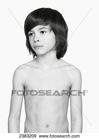 Stock Photo - Portrait of a young boy without a shirt; Quebec, Canada. Fotosearch