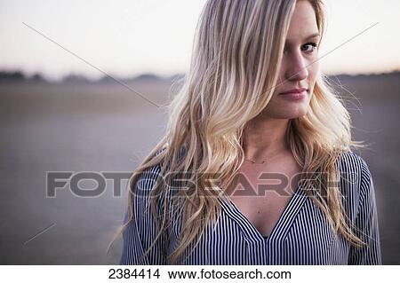 Portrait of a young woman with long blond hair; Victoria, British Columbia, Canada View Large Photo Image Picture - Portrait of a young woman with long blond hair; Victoria, British Columbia, Canada. Fotosearch