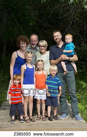 Portrait of three generations of a family; Stony Plain, Alberta, Canada View Large Photo Image Stock Image - Portrait of three generations of a family; Stony Plain, Alberta, Canada. Fotosearch