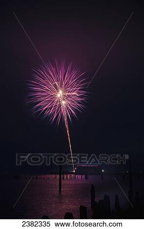 Stock Photography - Purple fireworks display; Astoria, Oregon, United States of America. Fotosearch