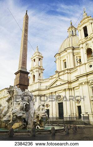 Sant'Agnese church and Fontana dei Quattro Fiumi with Obelisk of Domitian in Piazza Navona; Rome, Italy View Large Photo Image Stock Photograph - Sant'Agnese church and Fontana dei Quattro Fiumi with Obelisk of Domitian in Piazza Navona; Rome, Italy. Fotosearch