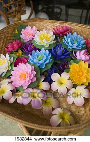 Picture - Silk flowers in a basket; Mae Sariang, Thailand. Fotosearch