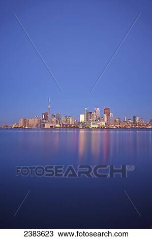 Stock Image - Skyline of Toronto and Lake Ontario; Toronto, Ontario, Canada. Fotosearch