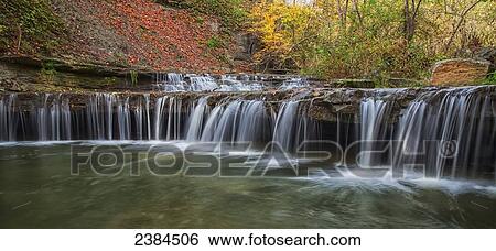 Small waterfall in a stream in Rock Glen Conservation Area in autumn; Ontario, Canada View Large Photo Image Stock Photograph - Small waterfall in a stream in Rock Glen Conservation Area in autumn; Ontario, Canada. Fotosearch
