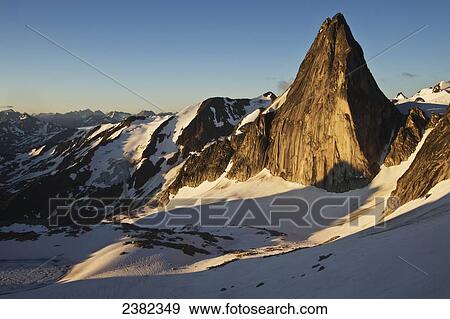 Stock Photo - Snowpatch Spire in the Bugaboos, Purcell Range, Columbia Mountains; British Columbia, Canada. Fotosearch