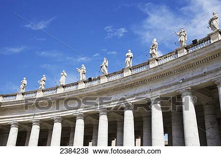 Stock Photo - Statues and tuscan colonnades, St. Peter's Square; Vatican City, Italy. Fotosearch