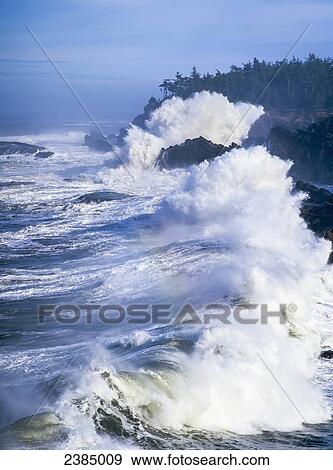 Stock Photo - Surf breaks on the rocks; Charleston, Oregon, United States of America. Fotosearch